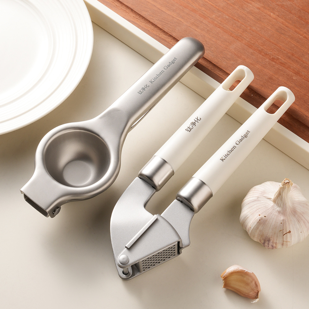 Roestvrijstalen citroenpers, k - Manual Garlic Press recensie en prijs
