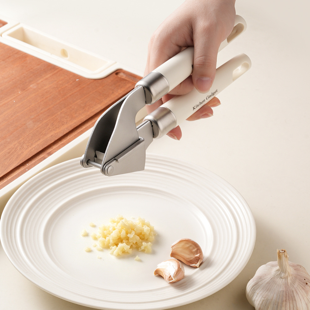 Roestvrijstalen citroenpers, k - Manual Garlic Press recensie en prijs