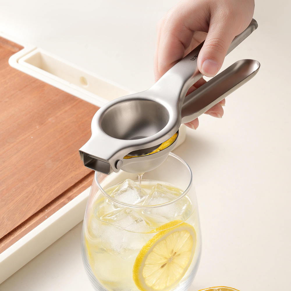 Roestvrijstalen citroenpers, k - Manual Garlic Press recensie en prijs